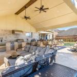 outdoor oasis: amazing outdoor space with outdoor kitchen, fireplace, patio cover, tv, and more